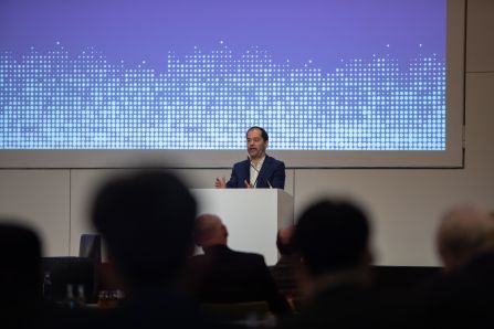Speaker presenting powerpoint