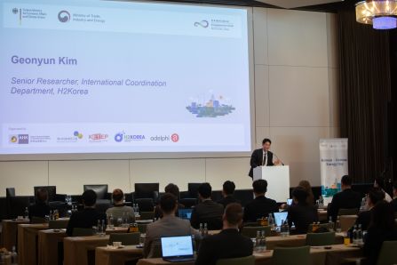 speaker infront of powerpoint