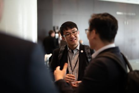 Two people smiling at each other, networking