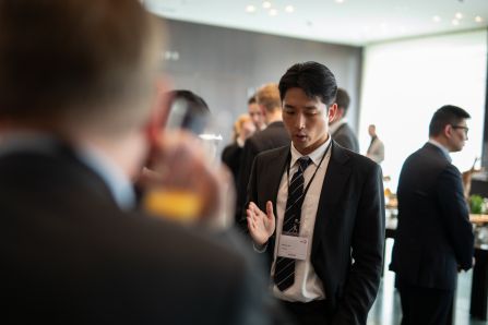 A person in the coffee break, talking and guesturing