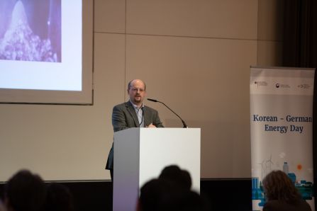 Speaker presenting from the distance