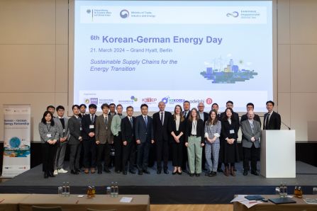 Group picture of all the speakers of the first session infront of the KGED banner